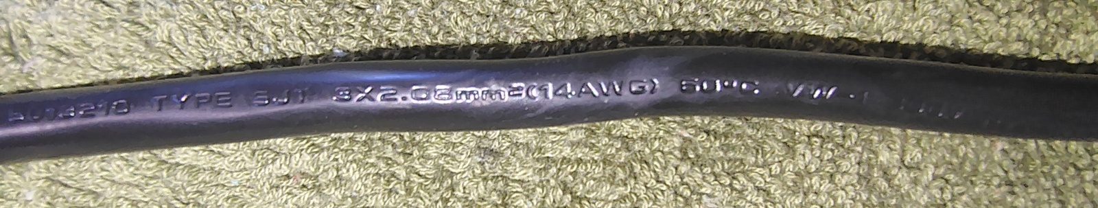 Power cord manufacturer markings.