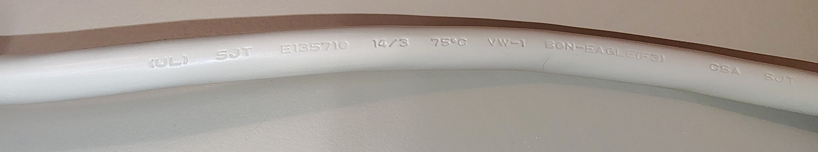Power cord markings showing UL and CSA approvals and SJT construction details.