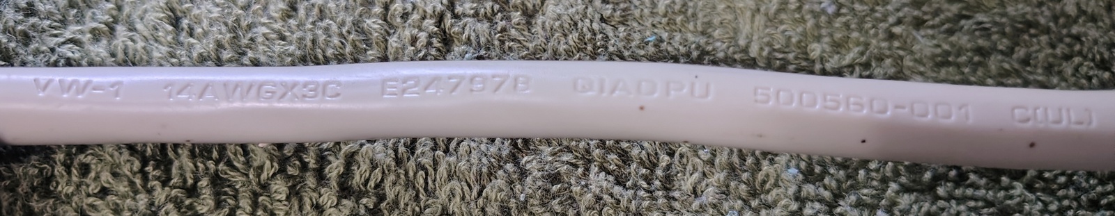 Power cord specifications and manufacturer markings.