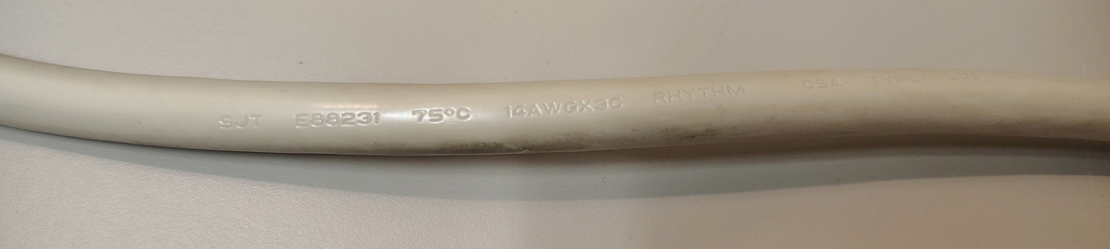 Power cord specification markings.