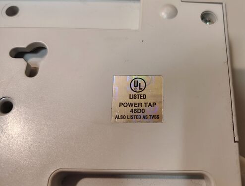 UL listing label identifying the device as a listed Power Tap and TVSS.