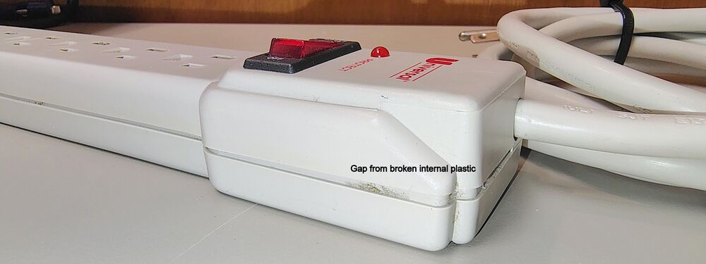 Housing separation caused by the broken internal screw post.