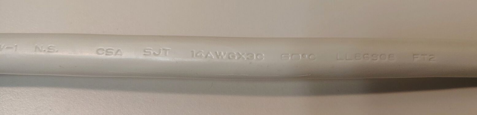 Additional power-cord markings showing CSA file number, conductor size, and cable ratings.