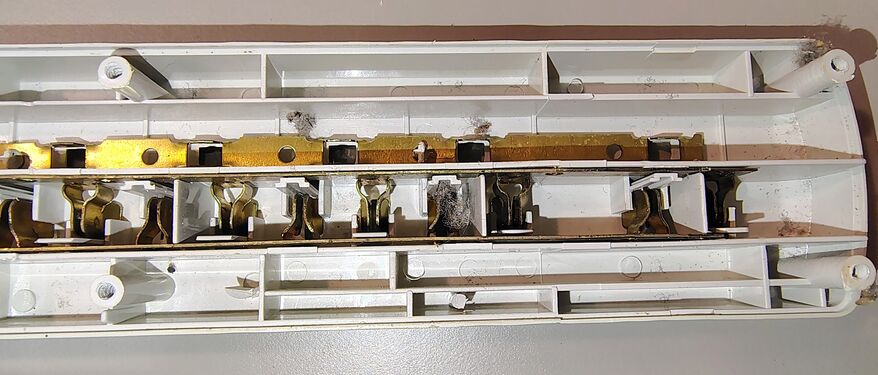 Center section showing bus bars and outlet contacts.