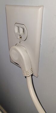P704URC1 connected to power using the right-angle attachment plug.