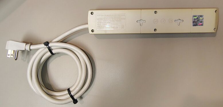 Underside view showing mounting provisions and product markings.