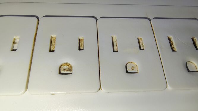 Sliding outlet covers in the closed position.