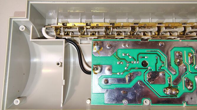 Outlet bus bars and suppression circuit board.