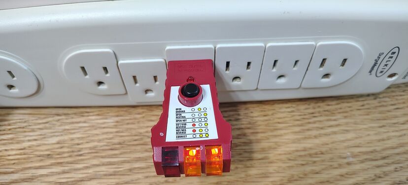 Outlet test confirming correct wiring and grounding.