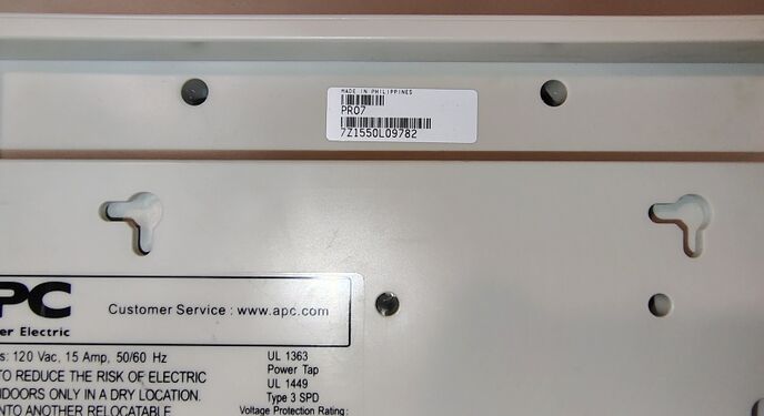 Serial-number label identifying the documented example as 7Z1550L09782 and manufactured in the Philippines.
