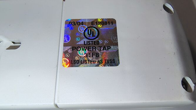 UL certification hologram and listing information.