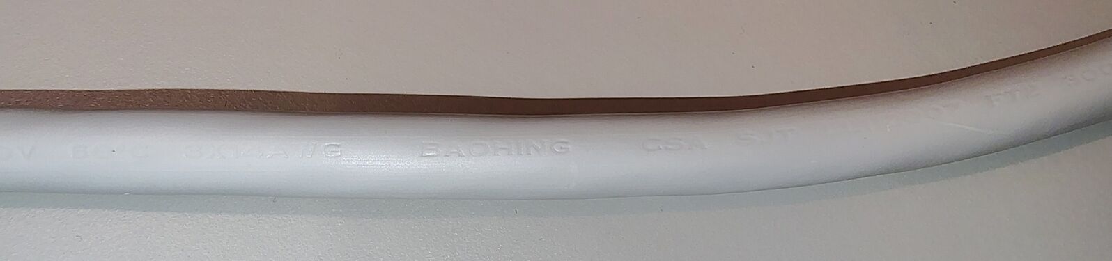 Additional power cord manufacturer markings.