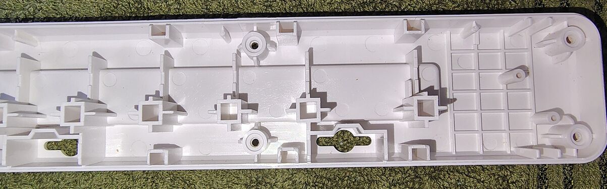 Upper housing details at the USB-port end.