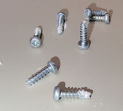 Enclosure screws removed during teardown.
