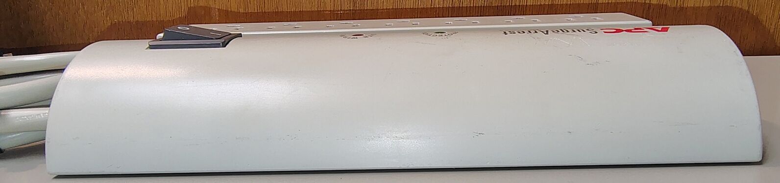 Curved-side profile showing the distinctive APC PRO7 upper enclosure.