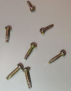 Enclosure screws removed during disassembly.