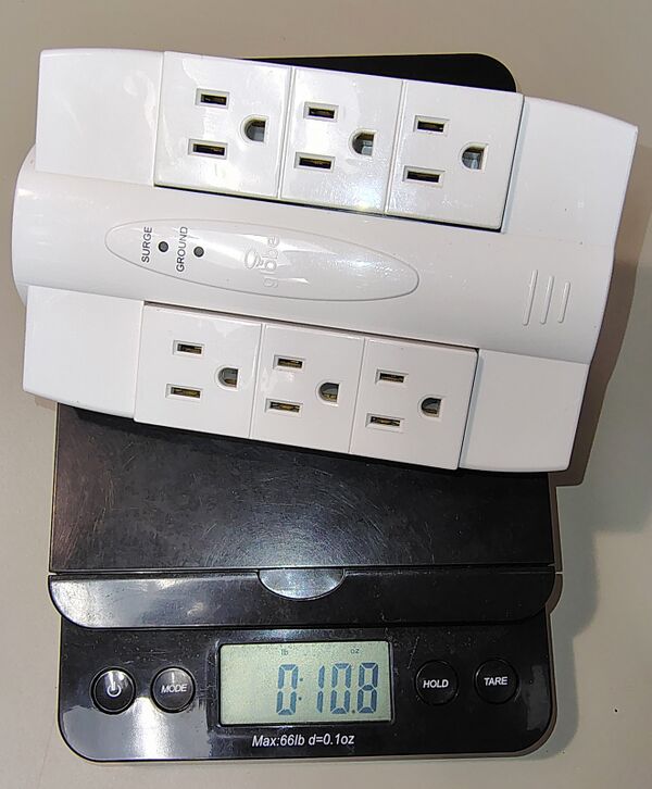 Globe Electric 12-003-7MS on a digital scale.