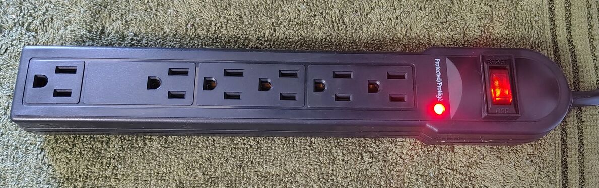 Protection indicator and power switch illuminated during testing.