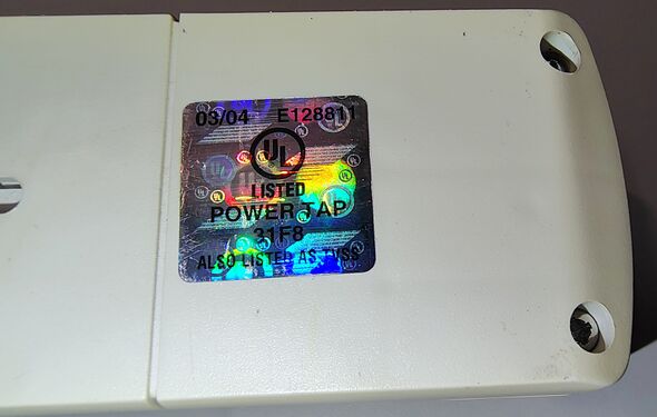 UL certification hologram and listing information.