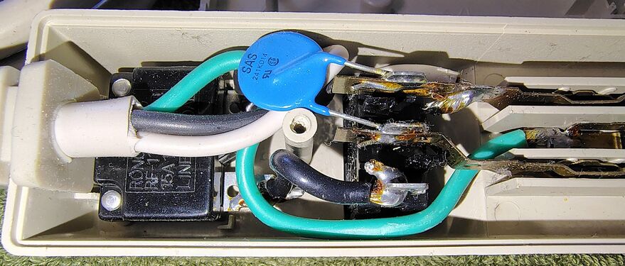 Single MOV surge-suppression component and associated wiring.
