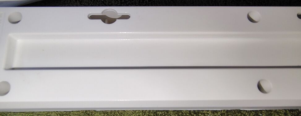 Center underside section showing mounting provisions.