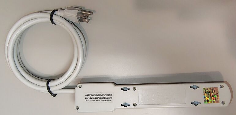Underside view showing mounting provisions and product markings.