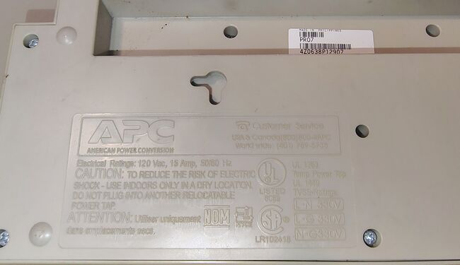 Molded electrical ratings, certification markings, and TVSS suppression ratings.