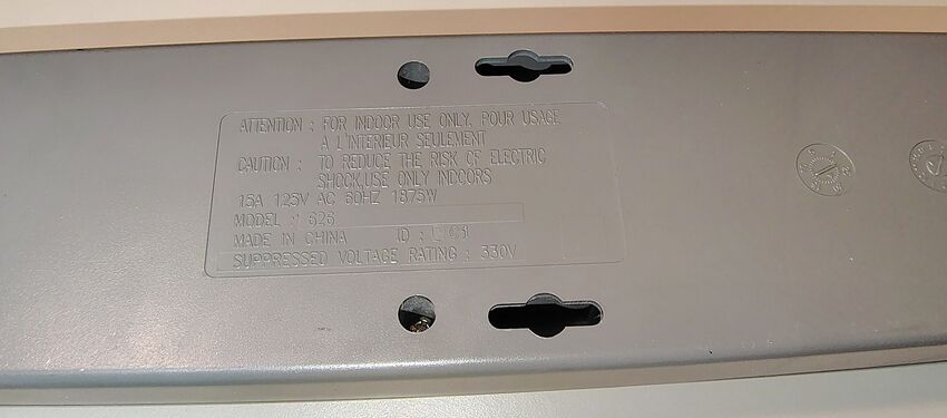 Model identification, electrical ratings, and suppressed voltage rating.
