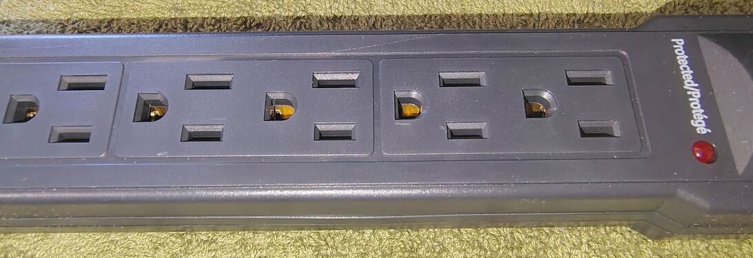 Outlet section and protection indicator.