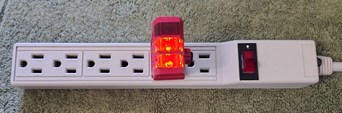 Outlet tester indicating correct wiring and grounding.