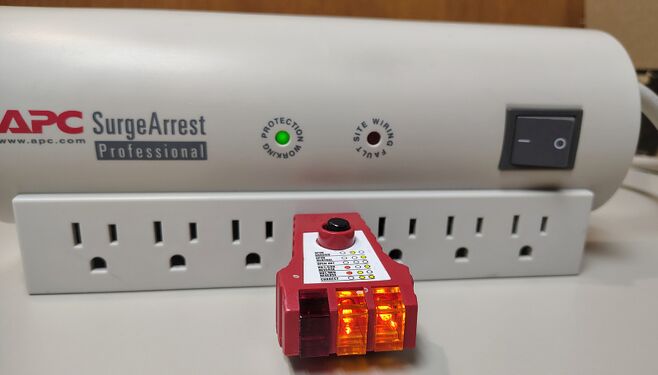 Outlet tester indicating correct wiring and grounding.