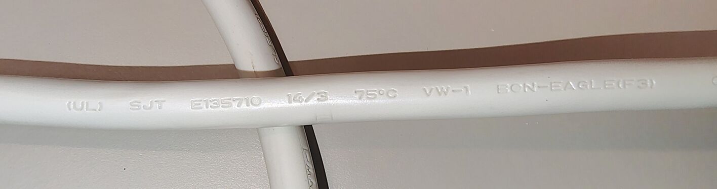 Power cord specifications and manufacturer markings.