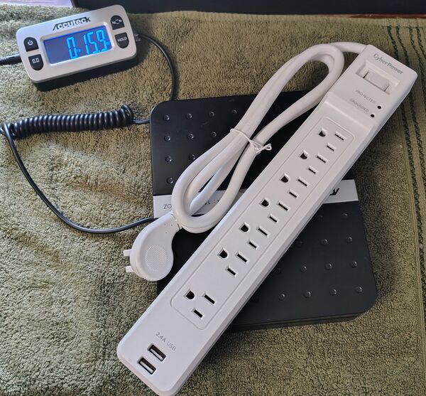 CyberPower P704URC1 on a digital scale.