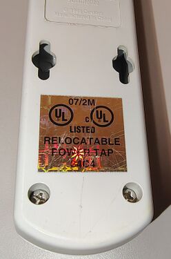UL certification label and mounting-slot detail.