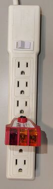 Outlet tester indicating no power output during testing.