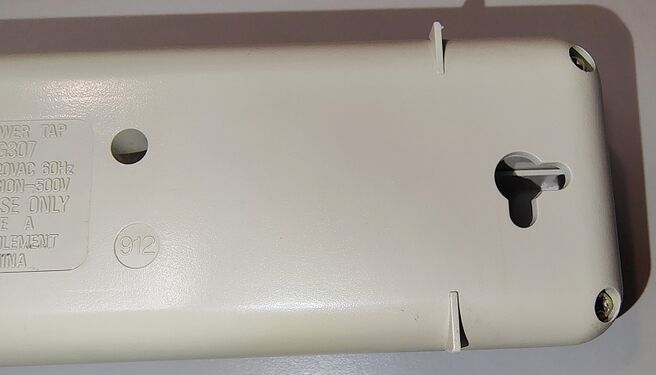 Bottom view of the end opposite the power cord.