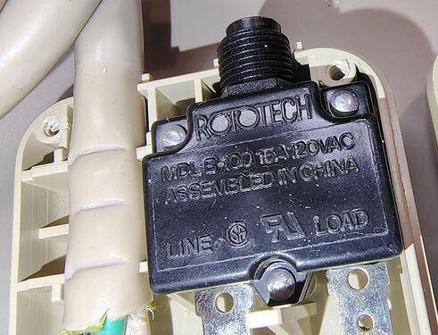 ROTECH Model R-100 push-button circuit breaker.