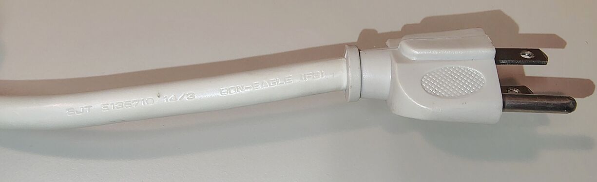 Straight-blade grounding attachment plug and power-cord assembly.