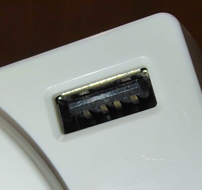 Close-up of an integrated USB Type-A charging port.