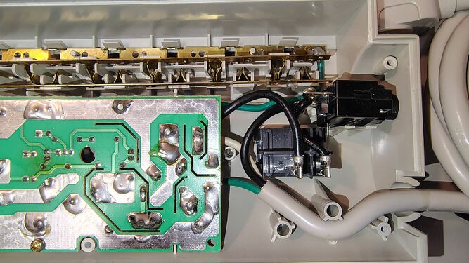 Switch-end wiring, circuit-breaker assembly, and underside of the suppression circuit board.