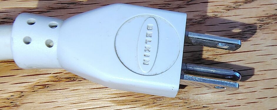 Belkin-branded grounding plug.
