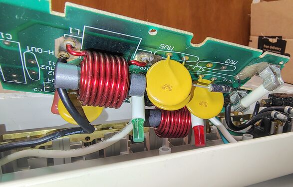 Suppression components including filtering inductors, MOVs, and protection circuitry mounted on the ©1993 board.