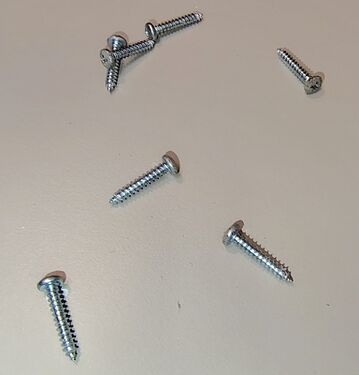 Enclosure screws removed during disassembly.