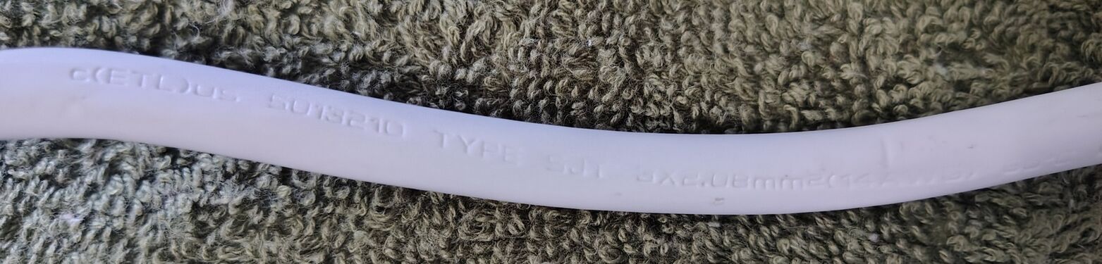 Power cord specifications and manufacturer markings.