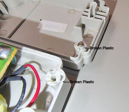 Broken internal screw-post assembly.