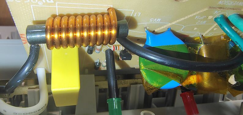 EMI/RFI filtering components, MOV surge-suppression circuitry, indicator assemblies, and associated wiring.