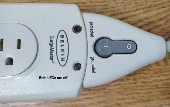 Protected and Grounded indicators unlit.