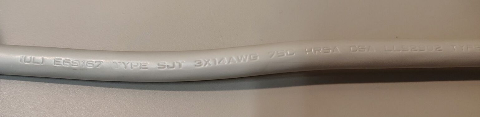 Power-cord markings showing HRSA manufacturer identification, UL file number E69167, and SJT 14 AWG construction.