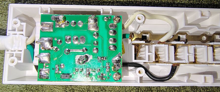Control-section circuitry, status indicators, and outlet-contact assemblies.