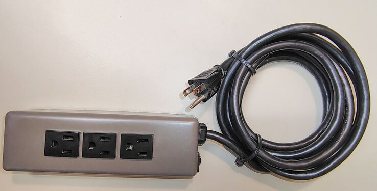 Overall view of the documented S.L. Waber 952M relocatable power tap distributed as part of the Herman Miller Energy Distribution System.